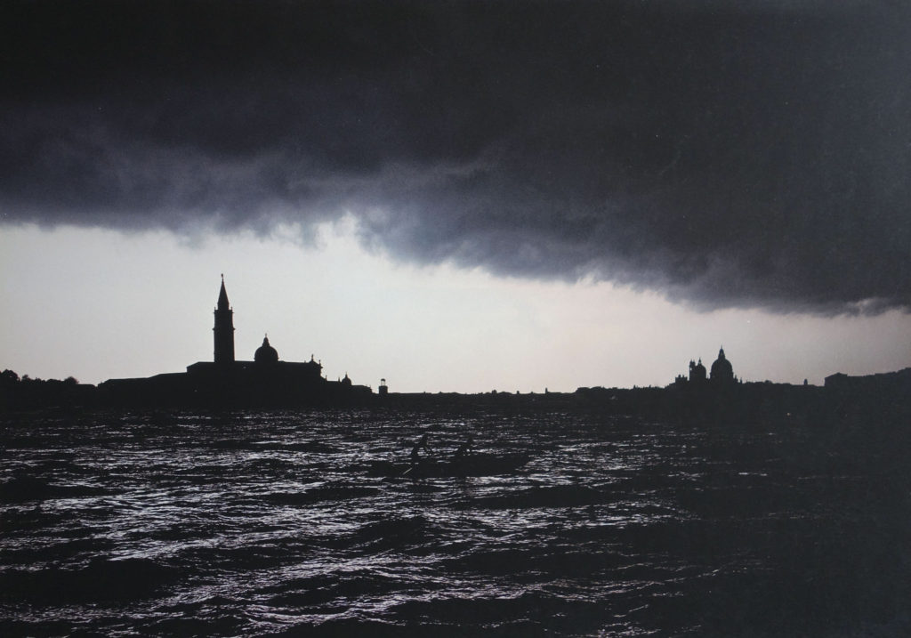 Venice lagoon under storm clouds, photographed by Derek Parfit